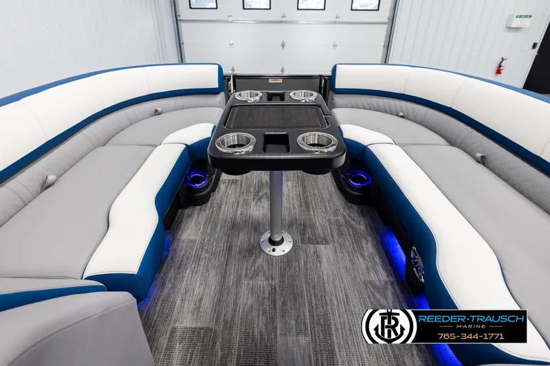 Slide: The Image of Luxurious 2025 Avalon Catalina QLS boat interior with plush seating and modern table design. - 20