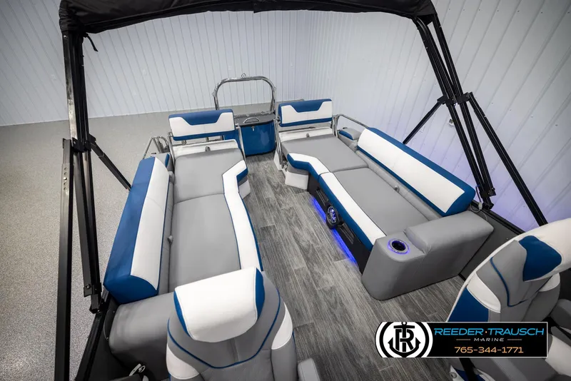 Slide: The Image of 2025 Avalon Catalina QLS boat interior with modern seating and sleek design. - 23