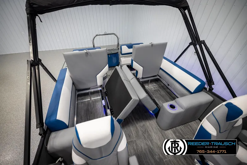 Slide: The Image of 2025 Avalon Catalina QLS boat interior with modern seating and sleek design. - 25