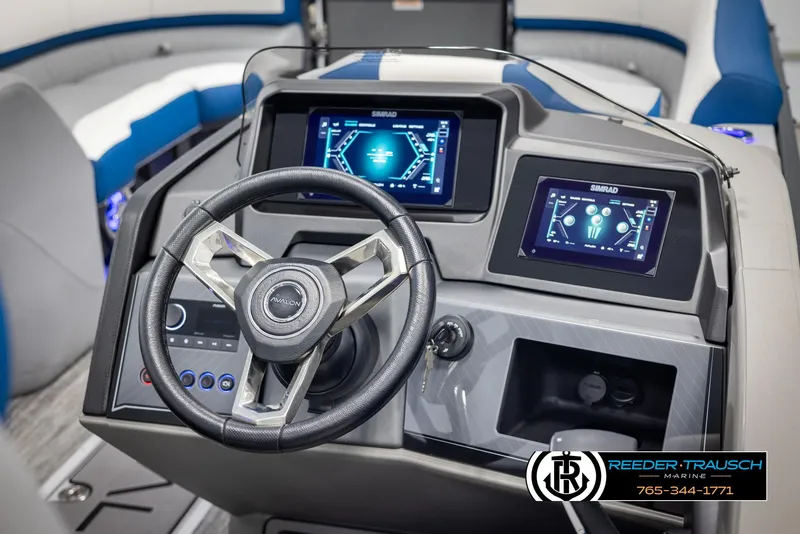 Slide: The Image of 2025 Avalon Catalina QLS boat dashboard with modern controls and dual displays. - 26
