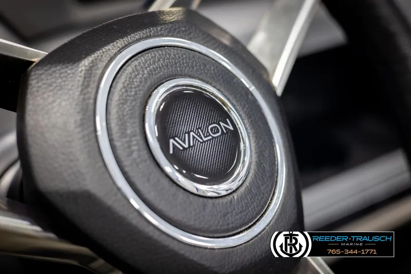 Slide: The Image of Close-up of 2025 Avalon Catalina QLS steering wheel with logo. - 28