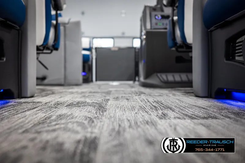 Slide: The Image of Interior of 2025 Avalon Catalina QLS with modern seating and carpet flooring. - 38