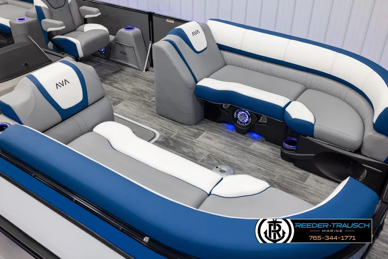 Slide: The Image of 2025 Avalon Catalina QLS boat interior with blue and white seating, modern design. - 9