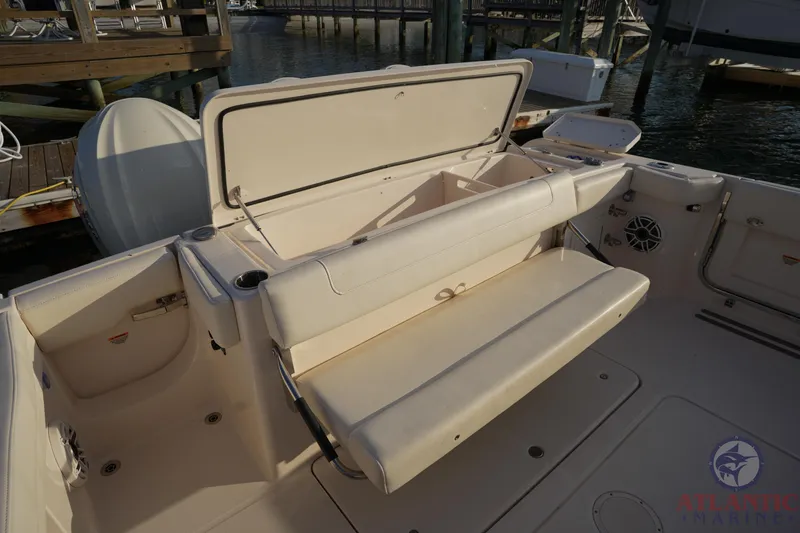 Slide: The Image of 2024 Grady-White Canyon 336 boat interior with open storage and seating. - 24