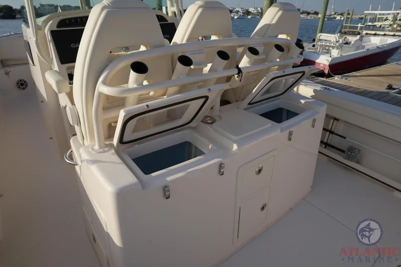 Slide: The Image of 2024 Grady-White Canyon 336 boat interior with seating and storage compartments. - 27