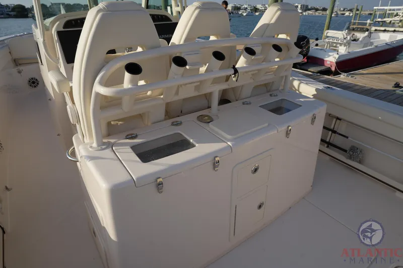 Slide: The Image of 2024 Grady-White Canyon 336 boat interior with seating and storage compartments. - 28