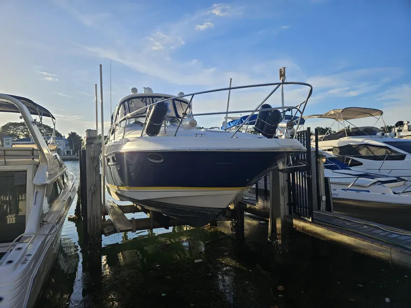 Slide: The Image of 2007 Regal 3760 Sportyacht docked at marina under clear blue sky. - 10