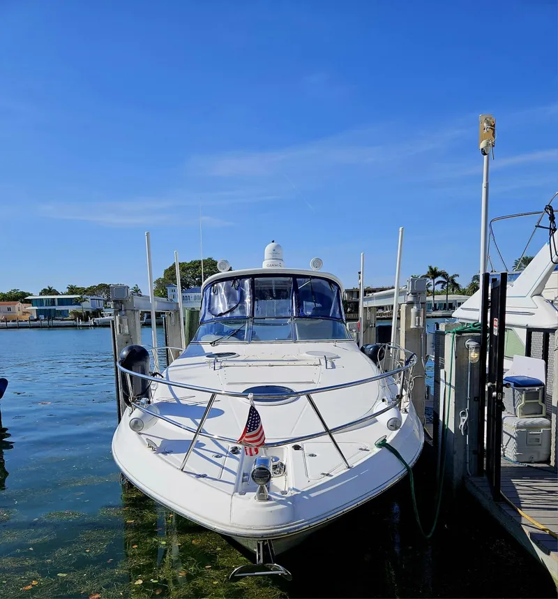 Slide: The Image of 2007 Regal 3760 Sportyacht docked in a sunny marina. - 14