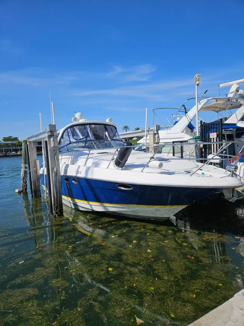 Slide: The Image of 2007 Regal 3760 Sportyacht docked in clear blue waters. - 16