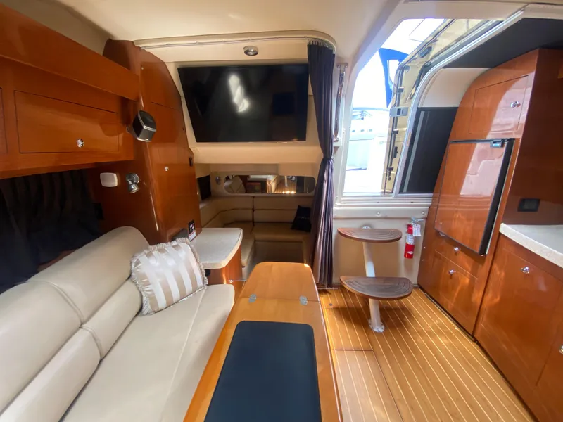 Slide: The Image of Interior of 2007 Regal 3760 Sportyacht with wood finish and comfortable seating. - 32
