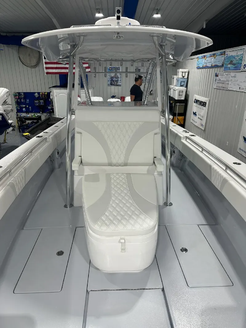 Slide: The Image of 2024 Contender 39 ST boat interior with seating and helm station. - 3
