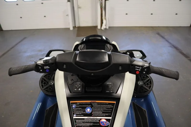 Slide: The Image of 2025 Yamaha WaveRunner FX Limited SVHO dashboard and controls in a garage setting. - 13
