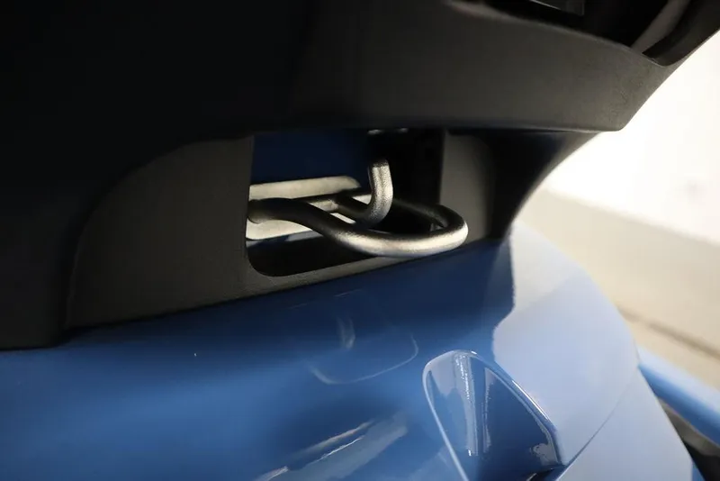 Slide: The Image of Close-up of 2025 Yamaha WaveRunner FX Limited SVHO in blue, showcasing a metal hook detail. - 24