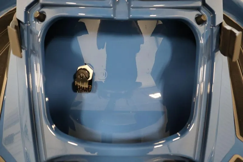 Slide: The Image of 2025 Yamaha WaveRunner FX Limited SVHO storage compartment, featuring a sleek blue interior design. - 27