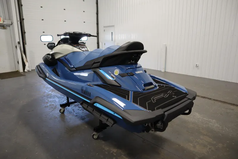 Slide: The Image of 2025 Yamaha WaveRunner FX Limited SVHO in showroom, blue and white design. - 4