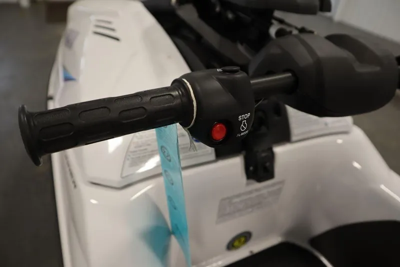 Slide: The Image of 2025 Yamaha WaveRunner SuperJet handlebar with stop button, close-up view. - 13