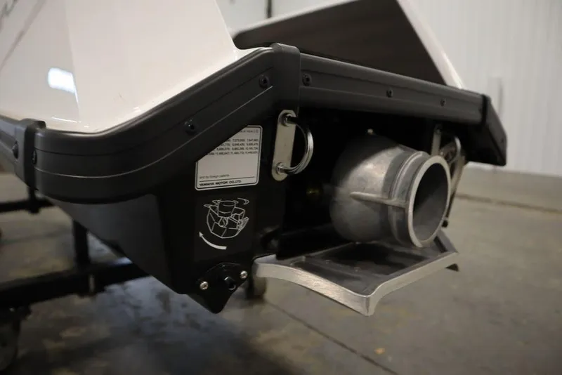 Slide: The Image of 2025 Yamaha WaveRunner SuperJet rear view, showcasing jet propulsion system in a garage setting. - 15