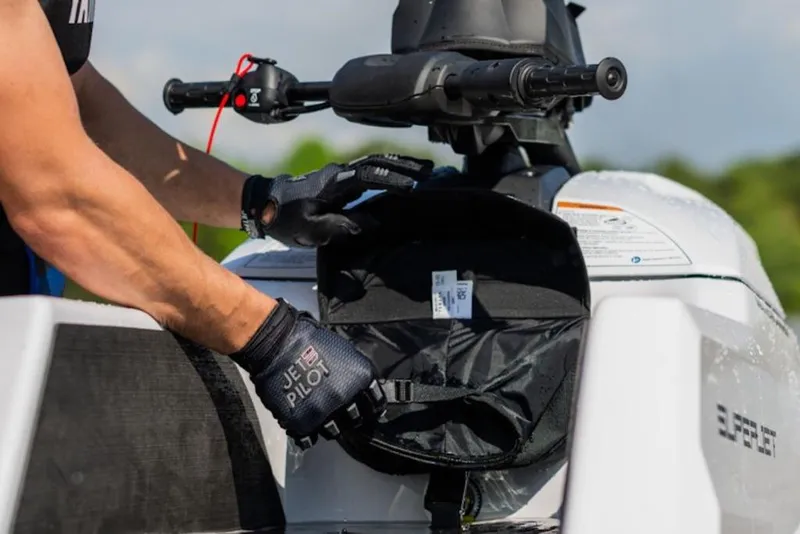 Slide: The Image of 2025 Yamaha WaveRunner SuperJet with storage compartment open, showing interior details. - 24