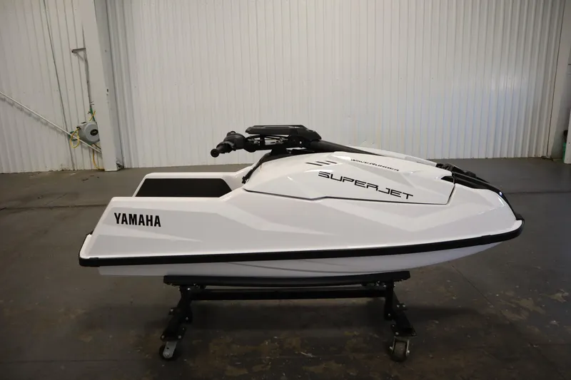 Slide: The Image of 2025 Yamaha WaveRunner SuperJet in a garage, showcasing sleek design and modern features. - 3