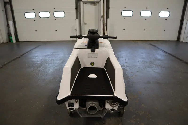 Slide: The Image of 2025 Yamaha WaveRunner SuperJet in a spacious indoor garage setting. - 4