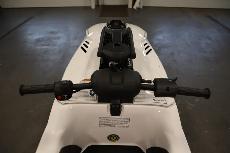 Slide: The Image of 2025 Yamaha WaveRunner SuperJet in a garage, rear view, showcasing sleek design. - 7