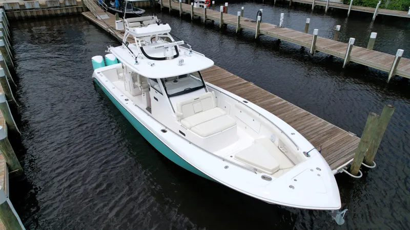 Slide: The Image of 2017 Everglades 435 Center Console boat docked at marina, aerial view. - 11