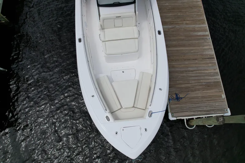 Slide: The Image of 2017 Everglades 435 Center Console boat docked on water, aerial view. - 12