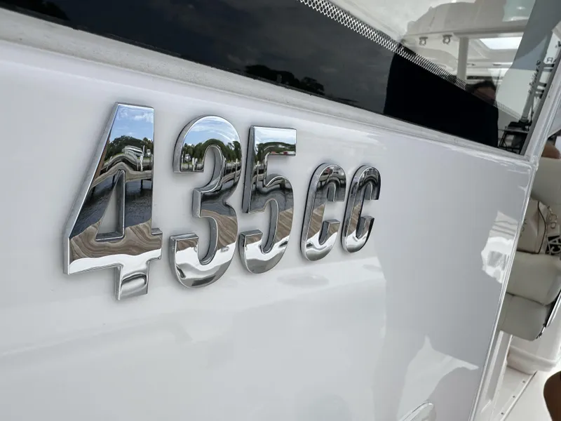 Slide: The Image of 2017 Everglades 435 Center Console boat with chrome "435cc" emblem. - 19