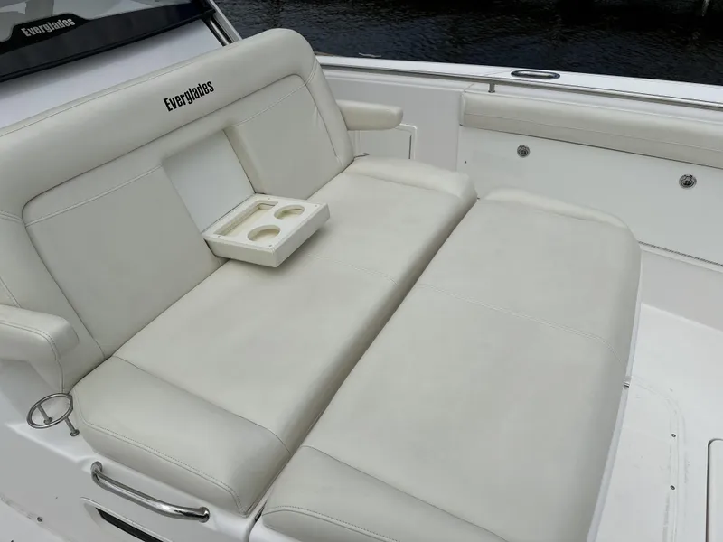 Slide: The Image of Luxurious seating on 2017 Everglades 435 Center Console boat with cup holders. - 30