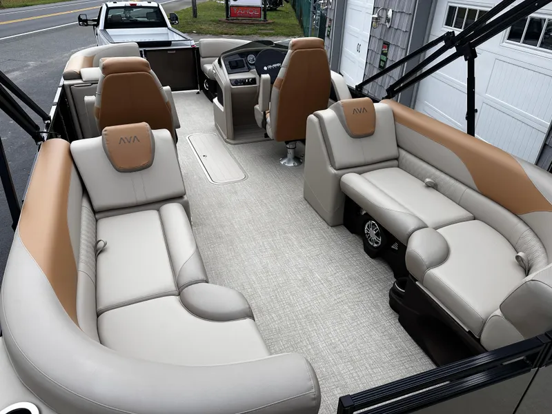 Slide: The Image of 2025 Avalon 2385 LSZ Quad Lounger, Tri Toon boat interior with beige seating and modern design. - 14