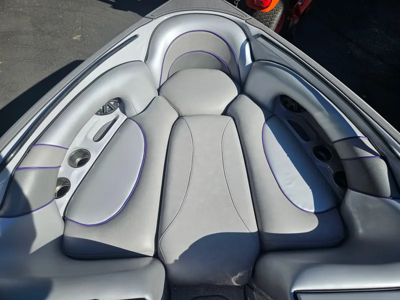 Slide: The Image of 2023 Sanger V215 LTZ boat interior with gray cushioned seating. - 14