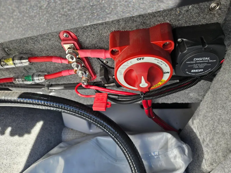 Slide: The Image of 2023 Sanger V215 LTZ boat battery switch and wiring components. - 17
