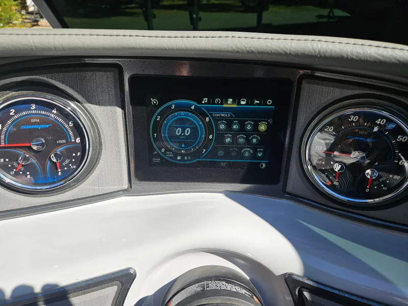Slide: The Image of 2023 Sanger V215 LTZ dashboard with digital display and analog gauges. - 20