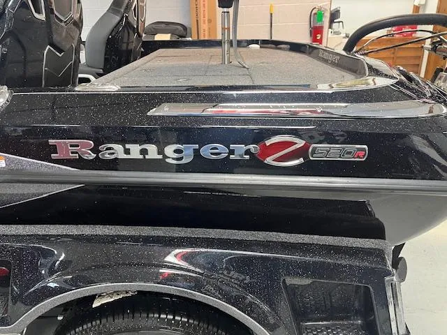 Slide: The Image of 2025 Ranger Z520R Ranger Cup Equipped boat, black exterior, close-up view. - 3