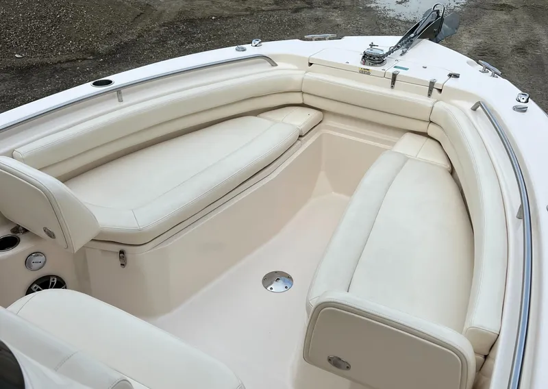 Slide: The Image of 2020 Grady-White 257 Fisherman boat interior with white cushioned seating. - 8