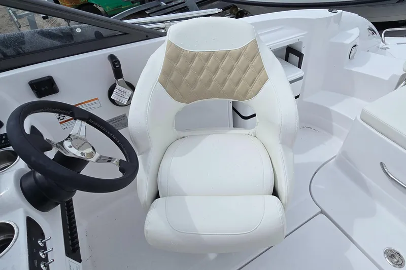 Slide: The Image of Captain's seat and steering wheel of 2025 SouthWind 2200 SD boat. - 10
