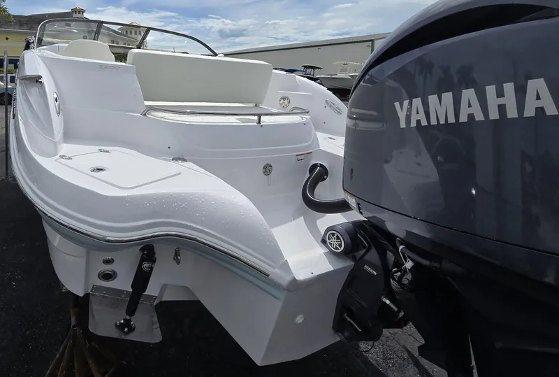 Slide: The Image of 2025 SouthWind 2200 SD boat with Yamaha outboard motor, rear view. - 6