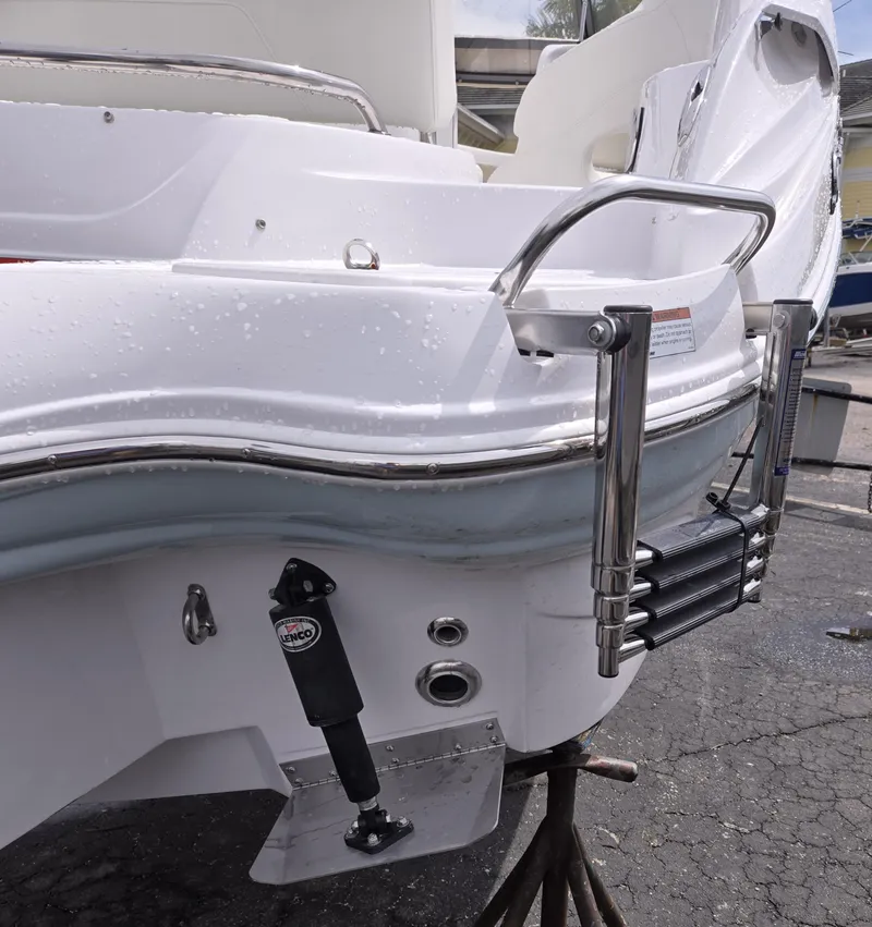 Slide: The Image of 2025 SouthWind 2200 SD boat stern with ladder and hydraulic components. - 7