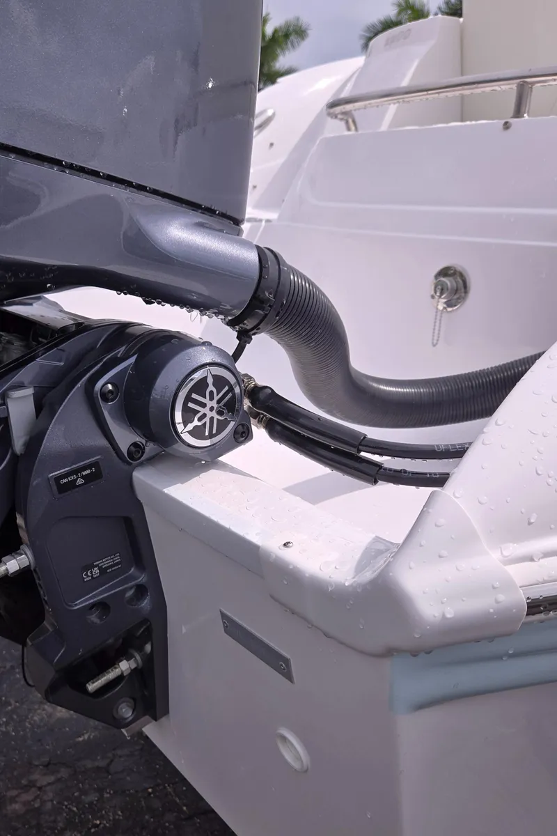 Slide: The Image of Close-up of 2025 SouthWind 2200 SD boat engine and stern details. - 8