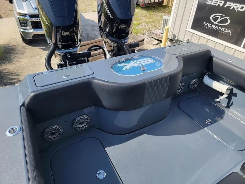 Slide: The Image of Shallow Sport 32 X3 boat, 2026 model, featuring dual engines and sleek design. - 14