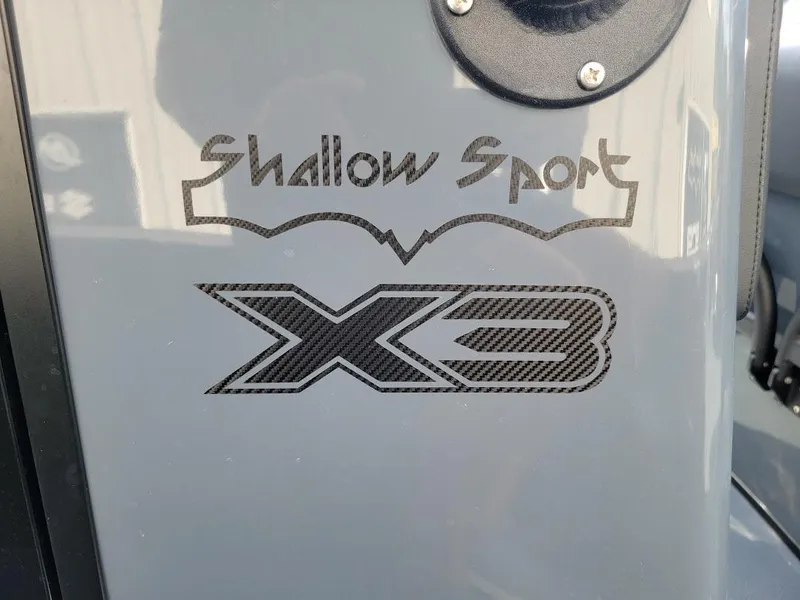 Slide: The Image of Shallow Sport 32 X3 2026 logo on a sleek gray surface. - 20