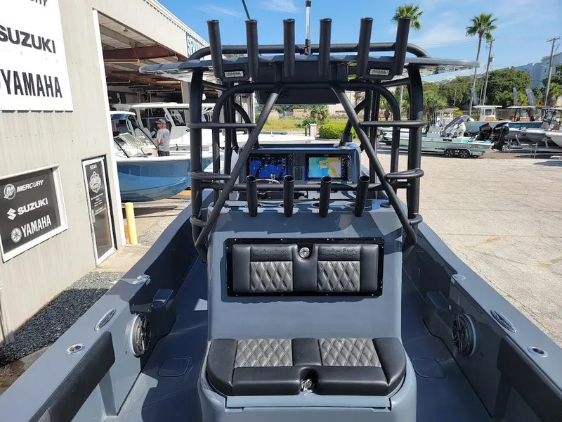 Slide: The Image of 2026 Shallow Sport 32 X3 boat interior with advanced navigation system and seating. - 25