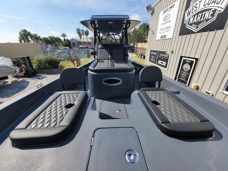 Slide: The Image of Shallow Sport 32 X3 boat, 2026 model, with sleek seating and modern design. - 26