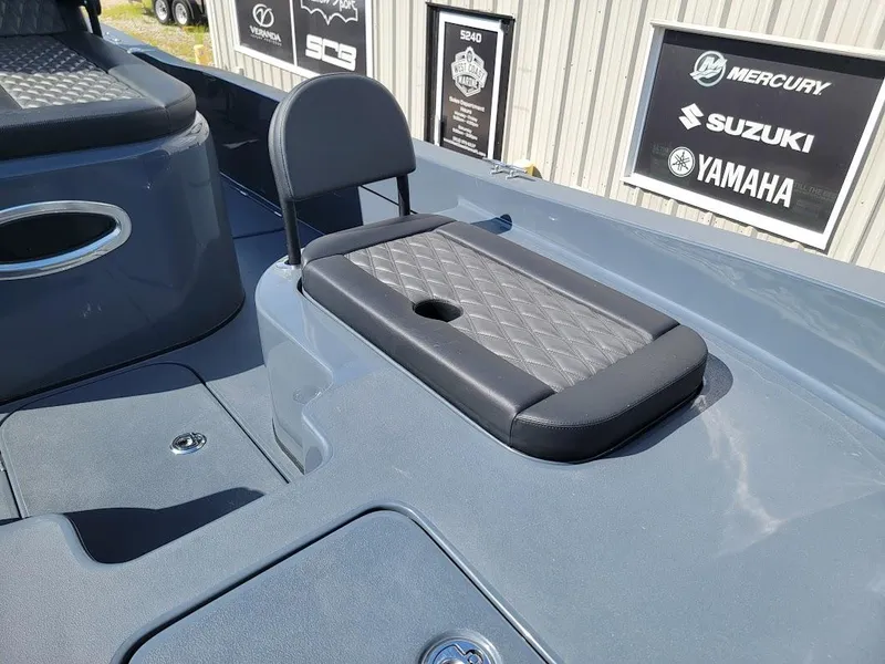 Slide: The Image of Shallow Sport 32 X3 2026 boat interior with cushioned seating and sleek design. - 28