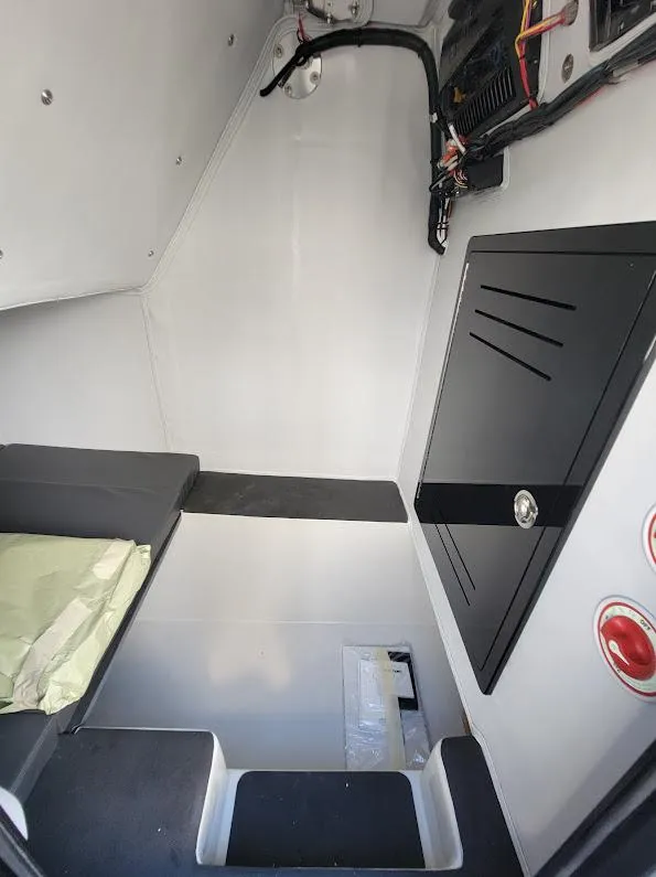 Slide: The Image of Interior of 2026 Shallow Sport 32 X3 boat, featuring sleek design and modern amenities. - 39