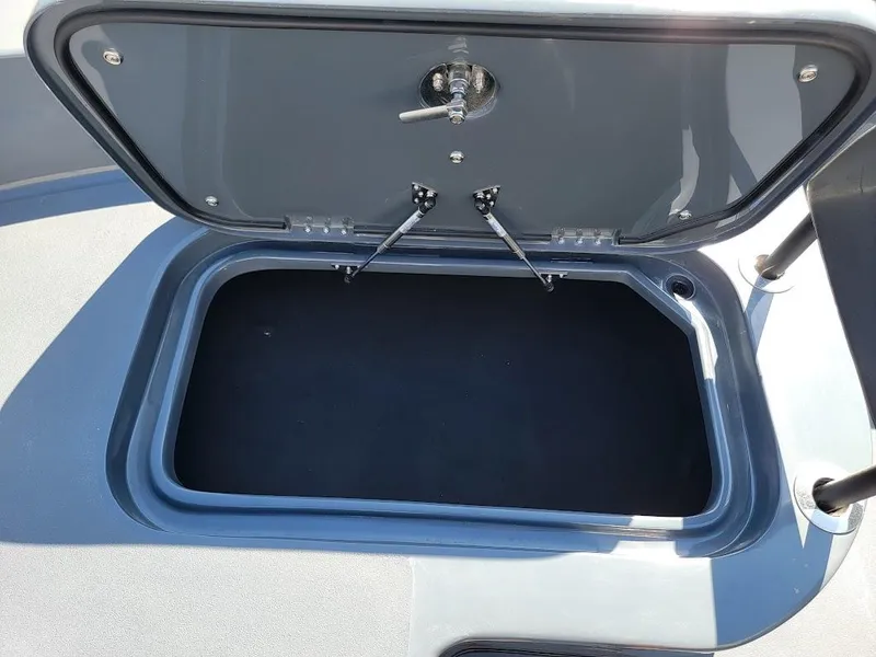 Slide: The Image of Open storage compartment on 2026 Shallow Sport 32 X3 boat. - 45