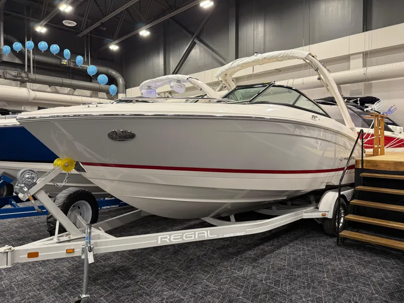 The Image of 2025 Regal LS4 boat on trailer outside Hern Marine dealership. - 0