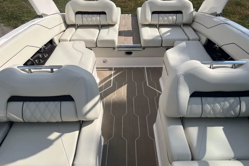 Slide: The Image of Luxurious interior of 2025 Regal LS4 boat with white leather seating. - 10