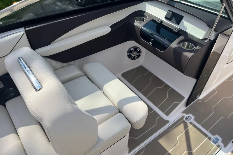 Slide: The Image of Luxurious interior of 2025 Regal LS4 boat with modern seating and sleek design. - 14