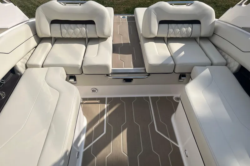 Slide: The Image of Luxurious interior of 2025 Regal LS4 boat with plush seating and elegant flooring. - 15